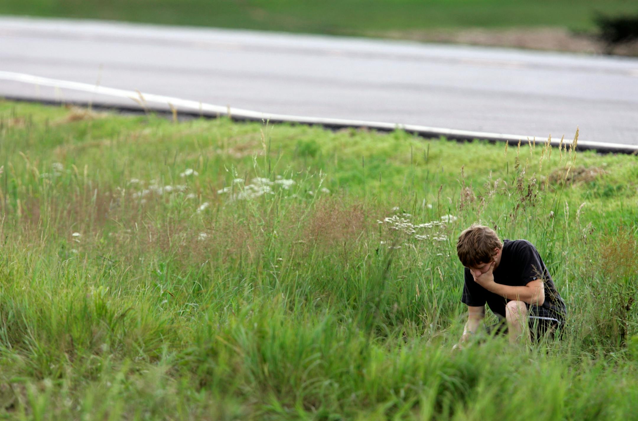 In July, Alex Harp, 18, visited the site near Princeton where friends Jordain Rust, 14, and Victoria Schumann Swanson, 17, died in a car crash.