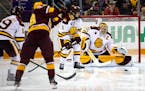 Minnesota Duluth goalie Hunter Shepard, stopping a shot against the Gophers in October, was seeking a third consecutive national title for the Bulldog