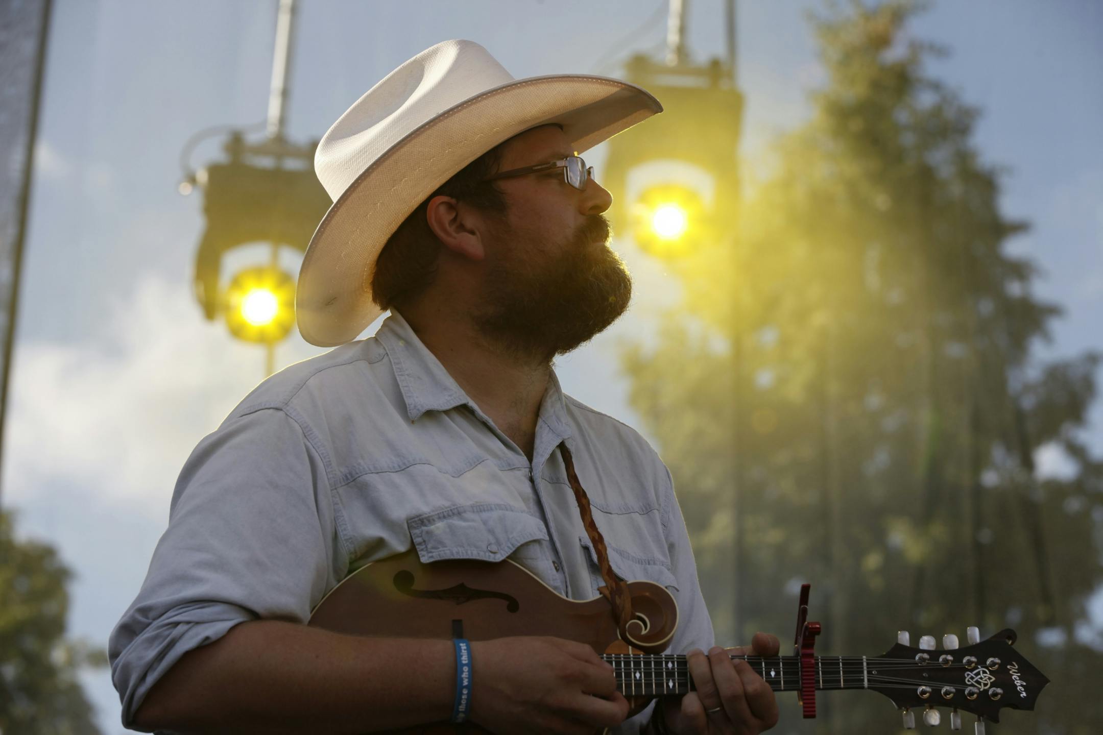 Trampled by Turtles's Erik Berry performs as the fourth act of the evening at the 2012 Rock the Garden concert in Minneapolis, Minn. on Saturday, June 16, 2012.