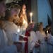 At Norwegian Memorial Lutheran Church in Minneapolis , June Ofstedal,(cq) 15 played Santa Lucia herself . She said "it was so exciting to be finally S
