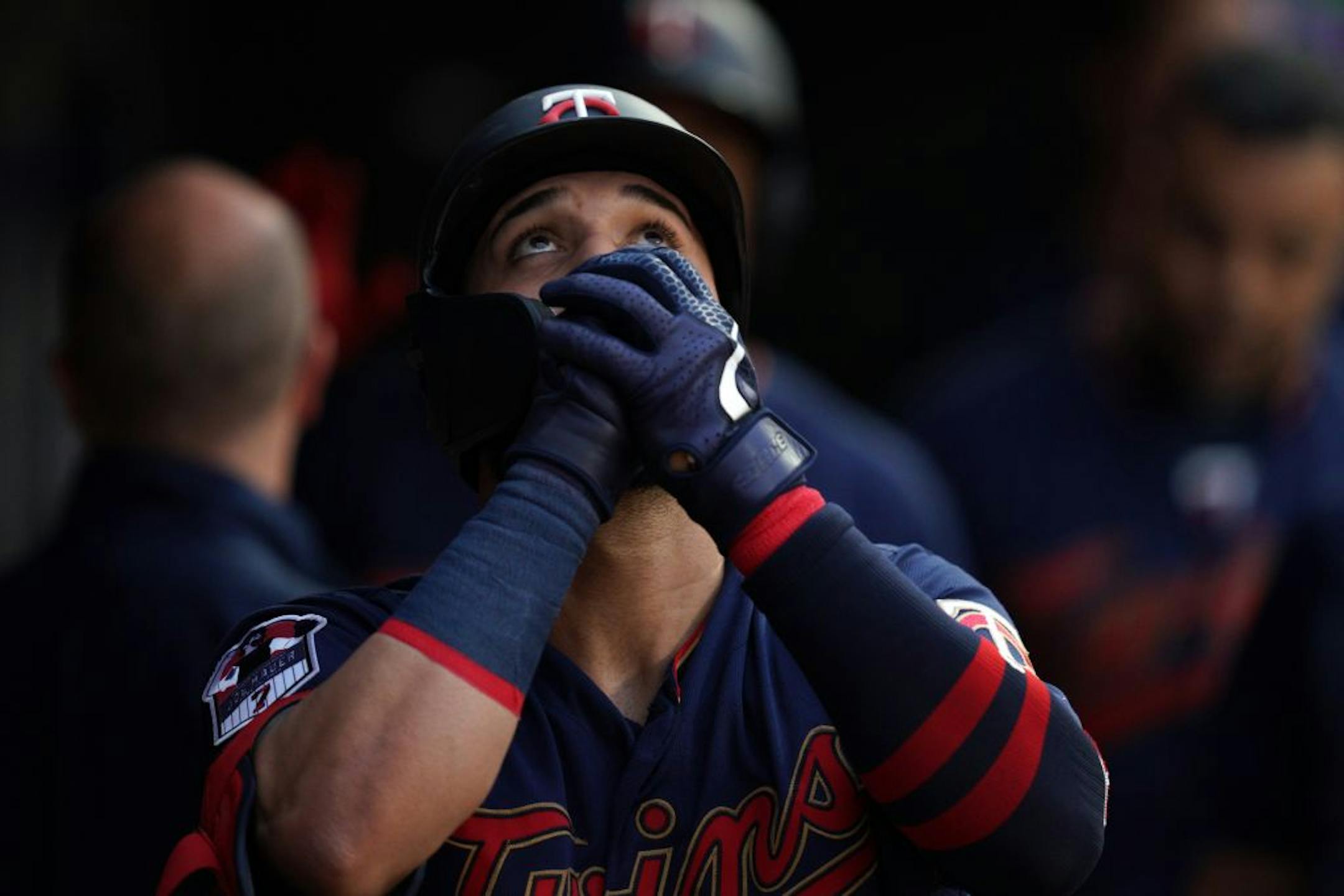 Minnesota Twins third baseman Marwin Gonzalez (9) celebrated in the dugout after hitting a two-run home run in the fifth inning.