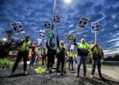 UAW local 862 members strike outside of Ford’s Kentucky Truck Plant in Louisville, Ky. on Thursday. The United Auto Workers union significantly esca