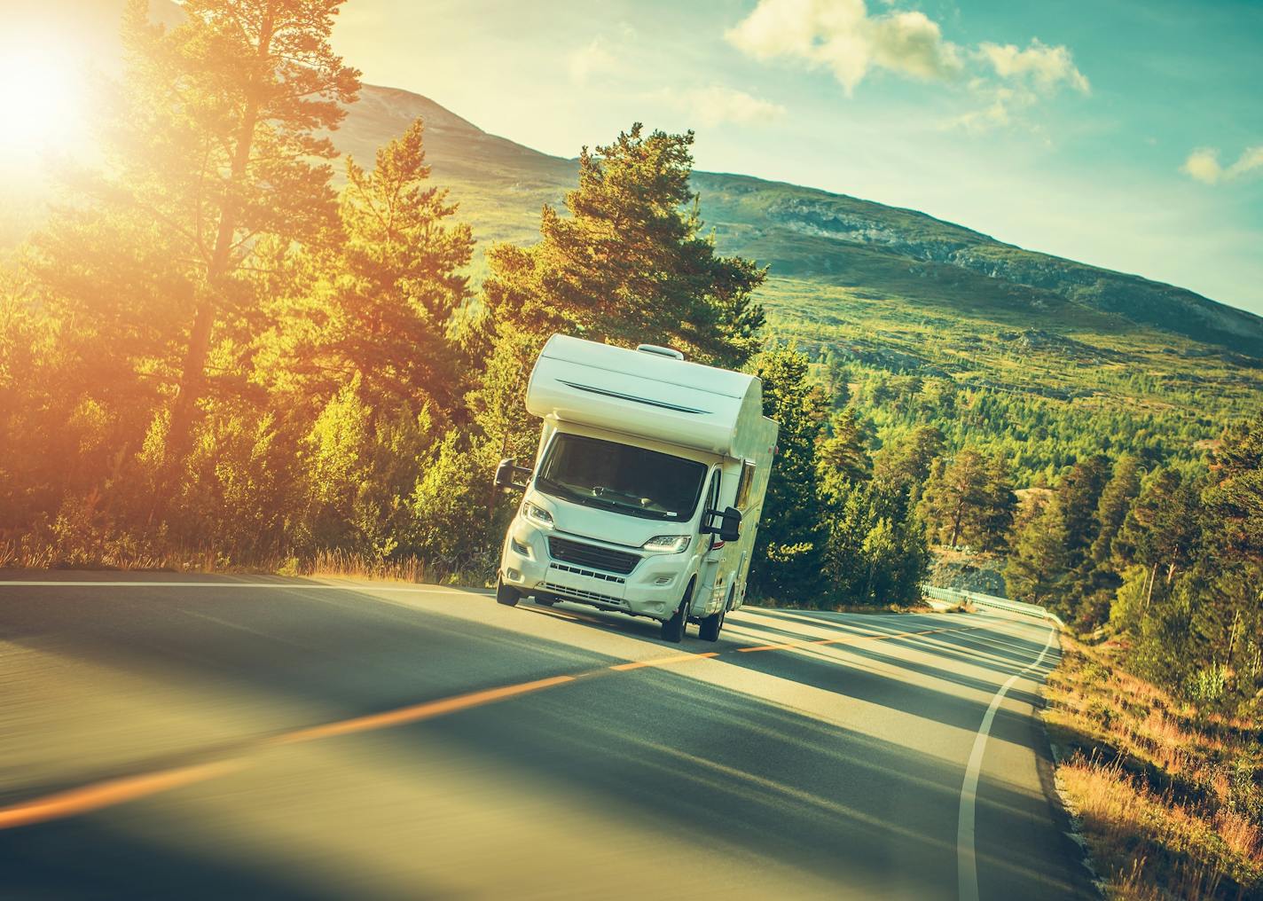 Camper Van Summer Trip. Scenic Norway Landscape and the Recreational Vehicle.