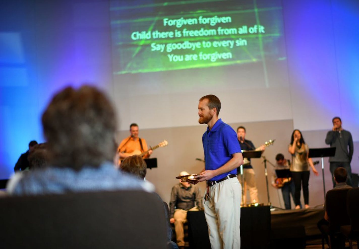 Jacob Rattray had attended an earlier service with his family at Crosspoint and volunteered to serve communion here for the second service.