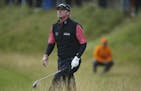 Steve Stricker of the US makes his way out of the rough on the 5th hole during the first round of the British Open Golf Championship, at Royal Birkdal