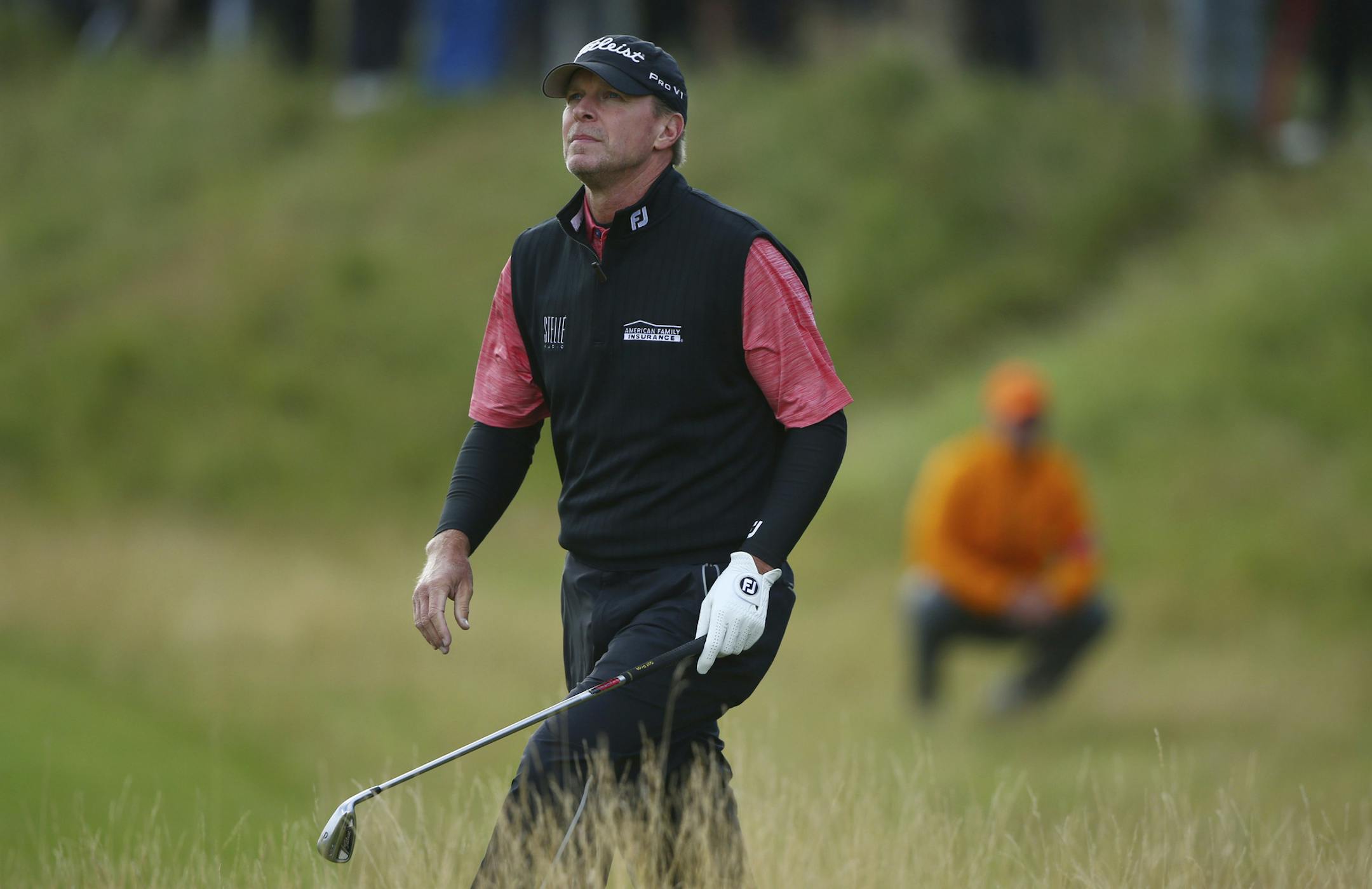 Steve Stricker of the US makes his way out of the rough on the 5th hole during the first round of the British Open Golf Championship, at Royal Birkdale, Southport, England Thursday, July 20, 2017. (AP Photo/Dave Thompson)