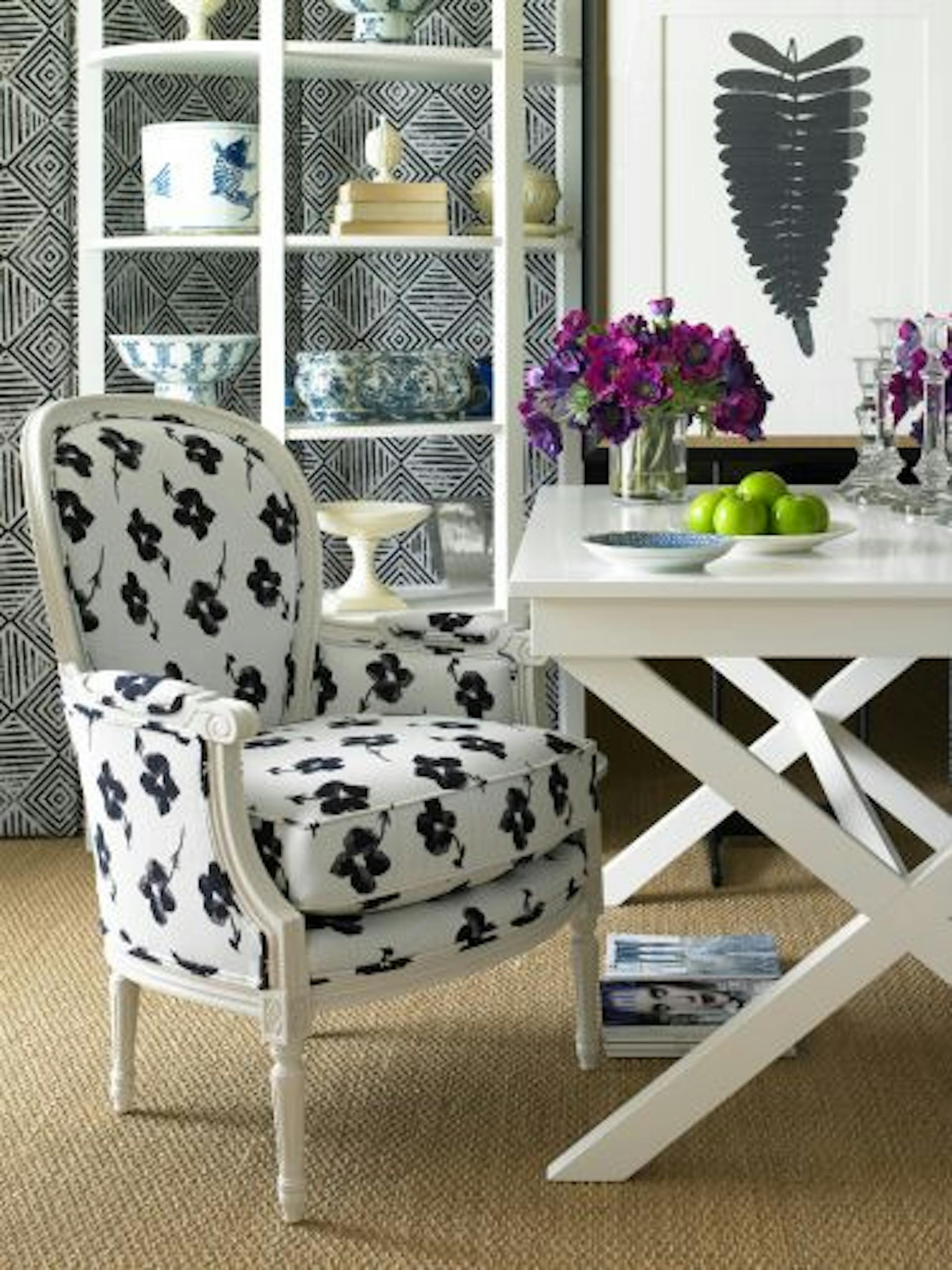 credit: Sunbrella FabricsGermaine chair in Tesora Indigo with upholstered screen in Zulu Ink. All fabrics from the Joe Ruggiero Sunbrella Collection. Furniture and fabrics available through Miles Talbott.