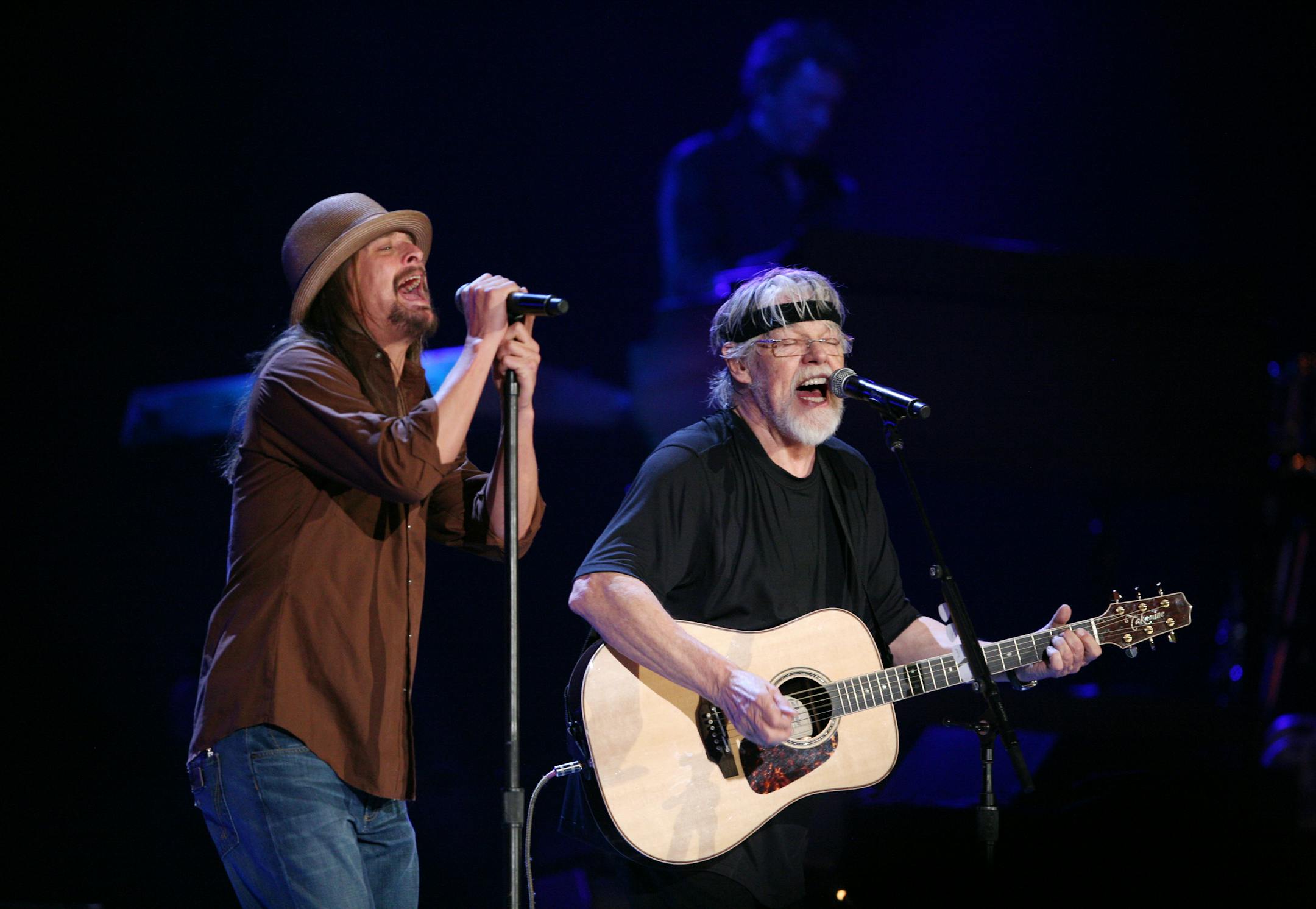 Detroit rock icons Kid Rock, left, and Bob Seger perform together after individual sets at Xcel Energy Center in St. Paul March 15, 2013.