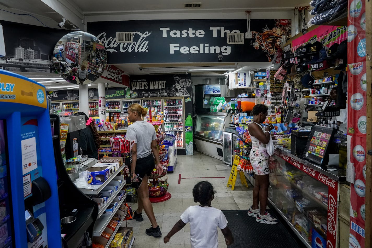 Kader's Market is one of the few food stores in the West End of Louisville. Shopper Fonz Brown noted: "Down here, you have more liquor stores than places where you can actually buy something to eat." MUST CREDIT: Washington Post photo by Jahi Chikwendiu