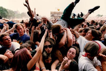 July 12, 1994 Lollapalooza 94, the fourth annual alternative rock festival held at Harriet Island in St. Paul. Fans are passed around in the Mosh Pit 