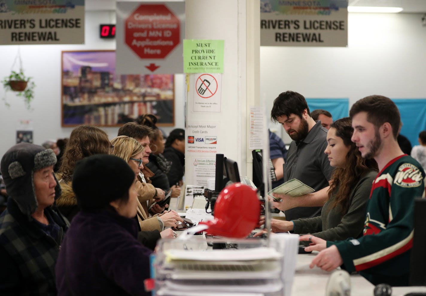 Customers experienced long wait times at the department of vehicle services office Friday at the Sears in St. Paul, Minn. ] ANTHONY SOUFFLE &#xef; anthony.souffle@startribune.com Sixteen weeks after the rollout of a new software system to handle vehicle licensing, tabs and titles in Minnesota, offices around the state are continuing to experience glitches and delays -- including a major slowdown of the system over the last couple of weeks.