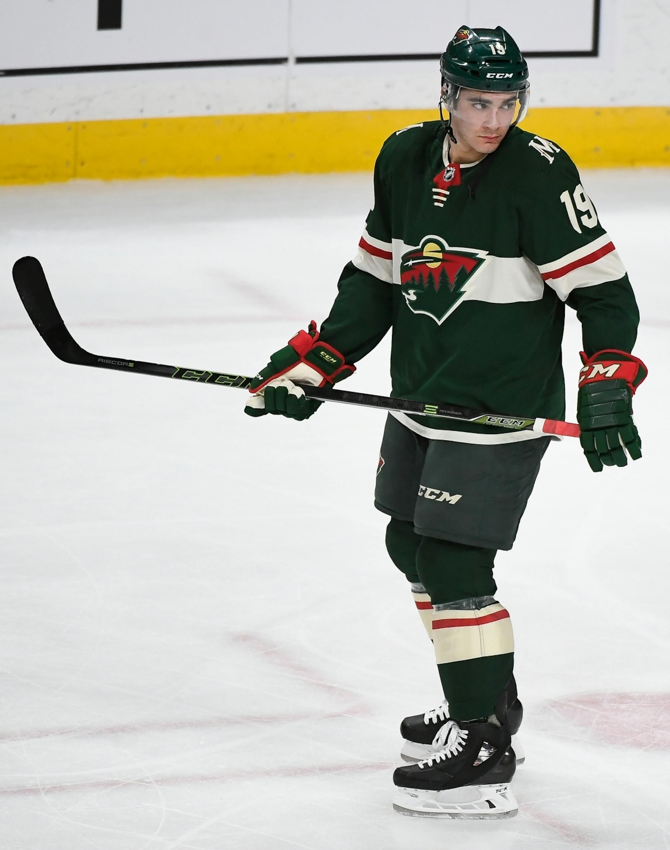 Minnesota Wild center Luke Kunin (19) looked on as his team warmed up before the start of Saturday night's game against the Columbus Blue Jackets.