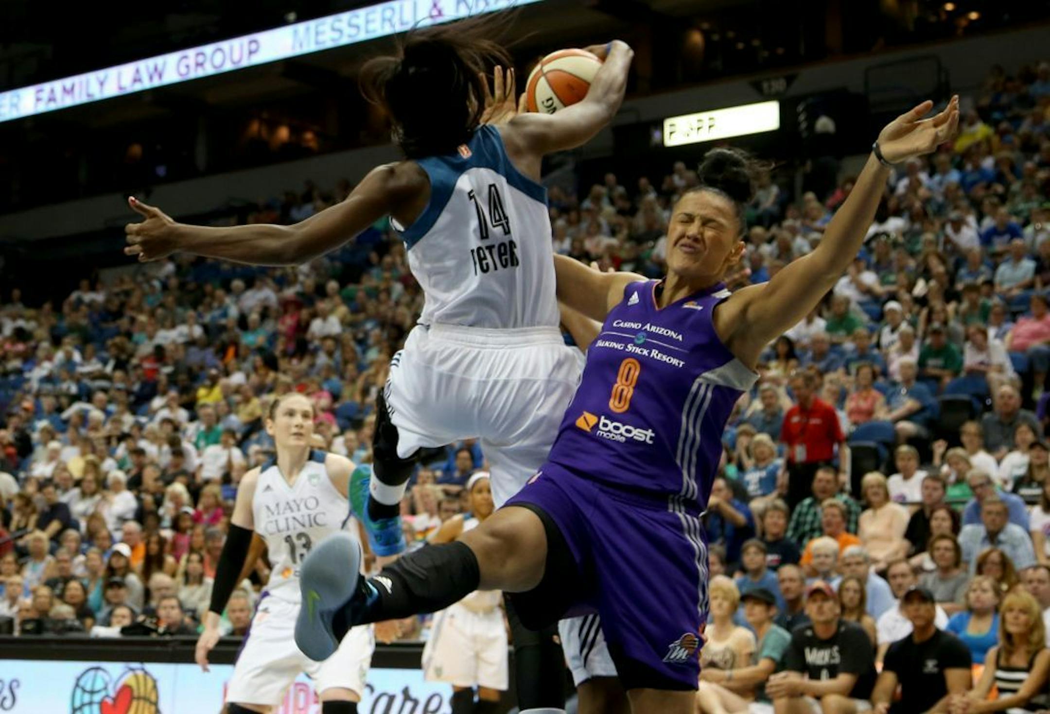 The Lynx's Devereaux Peters blocked the shot of Phoenix's Mistie Bass during a 2015 game.