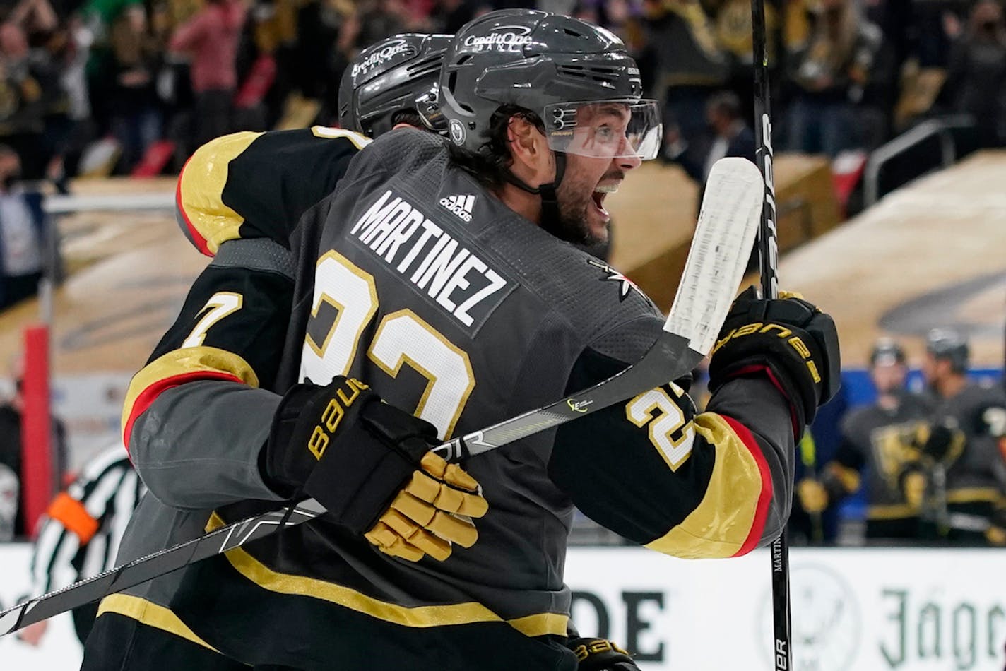 Vegas Golden Knights defenseman Alec Martinez (23) celebrates after a second period goal Monday.