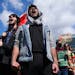 Pro-Palestinian supporters chant during a rally against the latest war between Israel and Hamas after University of Minnesota police cleared an encamp