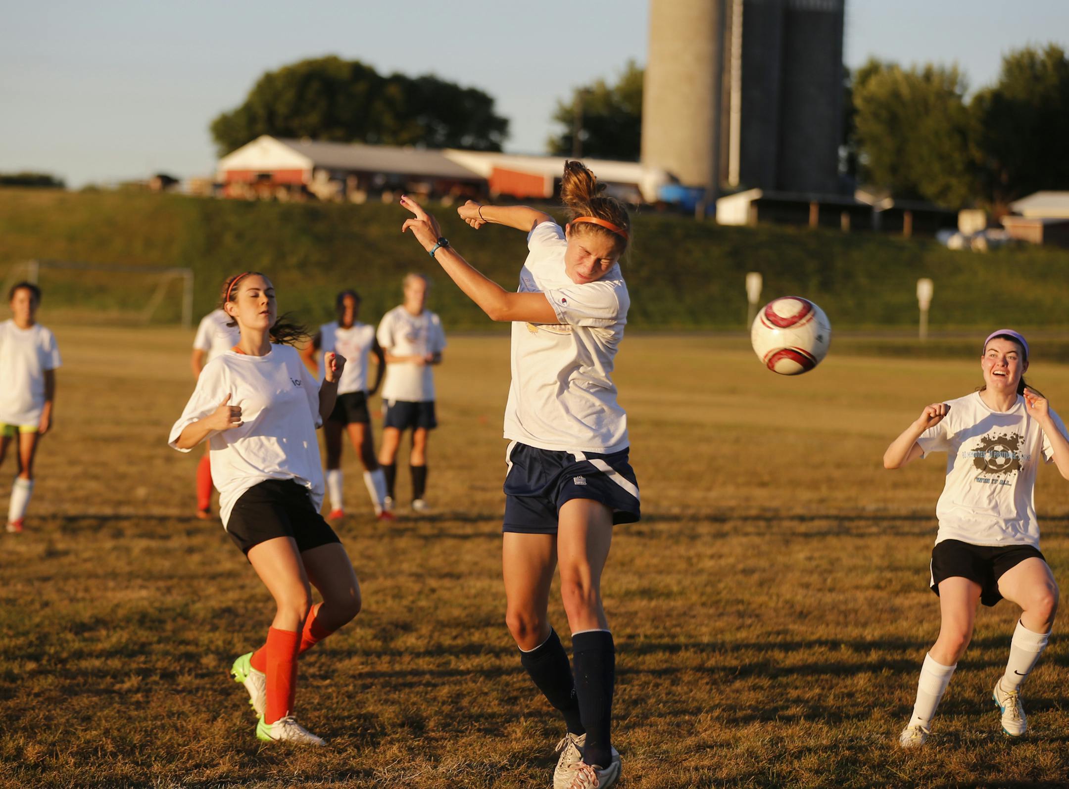 At Farmington H.S., the girl's soccer team practiced including Isabelle Ferm(with header) who is the star of the team.]richard tsong-taatarii/rtsong-taataarii@startribune.com