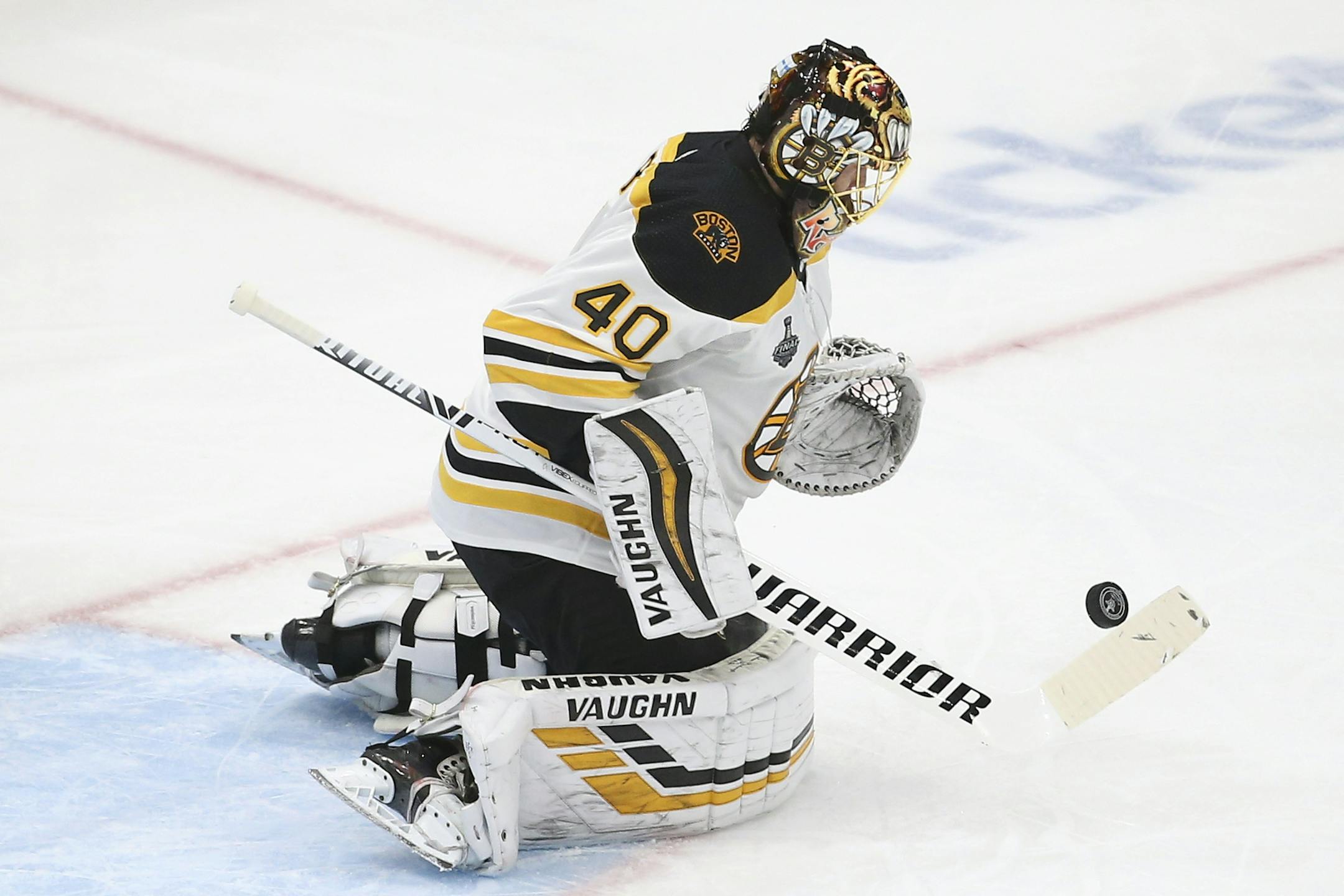 Boston Bruins goaltender Tuukka Rask, of Finland, blocks a shot against the St. Louis Blues during the second period of Game 6 of the NHL hockey Stanley Cup Final Sunday, June 9, 2019, in St. Louis. (AP Photo/Scott Kane)