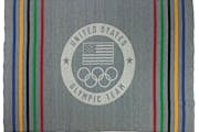 The Team USA Blanket Collection by Minnesota’s Faribault features the Olympic logo. 