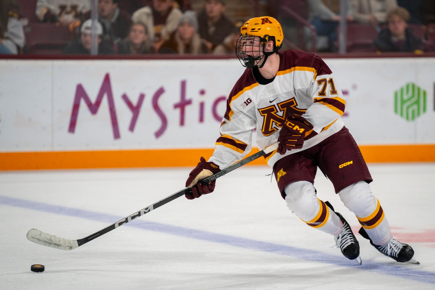 Minnesota defenseman Ryan Chesley (71) dribbles across the ice at the game against Wisconsin in 3M Arena at Mariucci on Friday, Oct. 27, 2023 in Minneapolis, Minn. Wisconsin won 3-2. ] Angelina Katsanis • angelina.katsanis@startribune.com