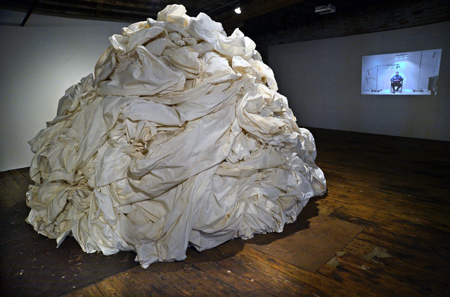 Minnesota Biennial at the Soap Factory, (Fabric pile) ROLU, Here There Then, Here There Now, 2011/2013, one mile of medical fabric used previously to create path at High Desert Test Site, Joshua Tree, CA] Richard.Sennott@startribune.com Richard Sennott/Star Tribune Minneapolis Minnesota Friday 9/6/13) ** (cq)