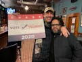 Jon Hamm, left, enjoyed some of the namesake decor at Palmer’s Bar in Minneapolis with owner Tony Zaccardi.
