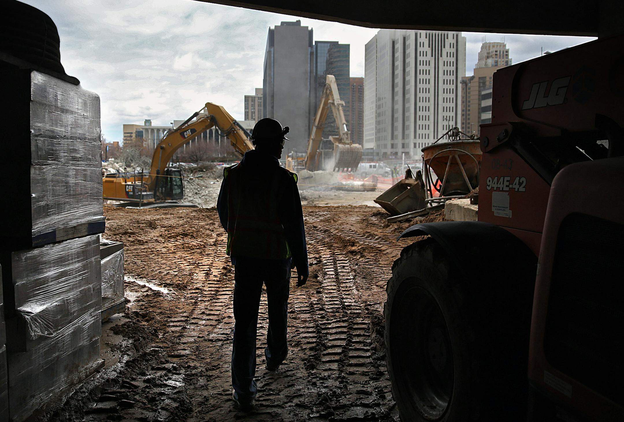 Construction work continues on an apartment building in downtown Minneapolis. Opus is the construction firm coordinating the project. In April, employment in construction grew by 32,000, with job growth in heavy and civil engineering construction (+11,000) and residential building (+7,000). Construction has added 189,000 jobs over the past year, with almost three-fourths of the gain occurring in the past 6 months. ] JIM GEHRZ ‚Ä¢ jgehrz@startribune.com / Burnsville, MN / May 2,