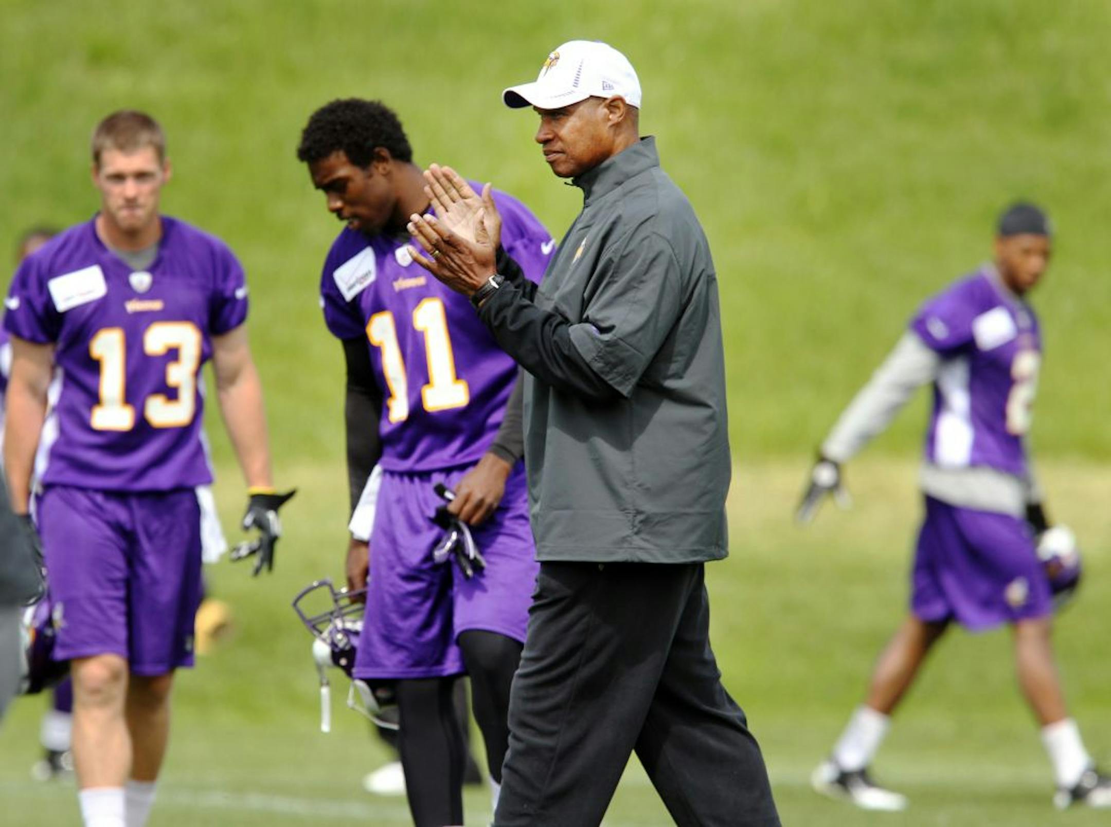 Minnesota Vikings head coach Leslie Frazier claps his hands during an optional workout at the team's practice facility Winter Park, Wednesday, May 30, 2012, in Eden Prairie, Minn.