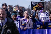 With members standing behind him, Jamie Gulley, President of SEIU Health Care MN & IA voiced his support for a $25 minimum wage and better benefits in