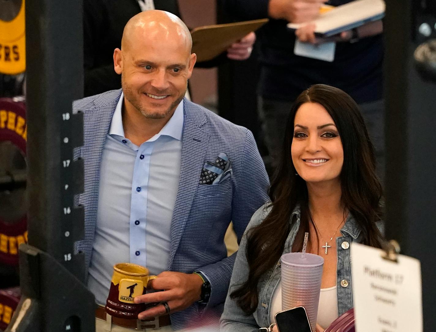 Gophers head football coach P.J. Fleck and his wife Heather Fleck watch the action during the Gophers annual pro day in front of NFL scouts Wednesday, March 16, 2022 at the University of Minnesota Minneapolis, Minn. ]