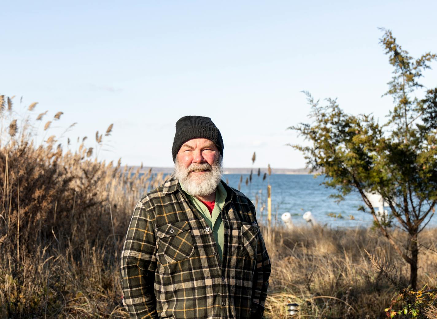 Ken Dorph, a Sag Harbor resident who was hired as a volunteer to wear a Santa Claus costume at an event hosted by the local chamber of commerce, in Sag Harbor, N.Y., on Dec. 13, 2023. Dorph had grown a white beard, but a tense discussion about the Israel-Hamas war at a local synagogue led to complaints that cost him his job. (Lindsay Morris/The New York Times)