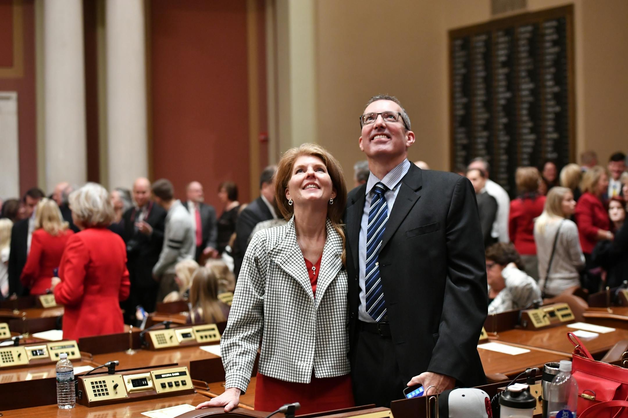 Rep. Regina Barr, R-Inver Grove Heights and her husband Kevin looked around the House Chamber before the swearing in in 2017.