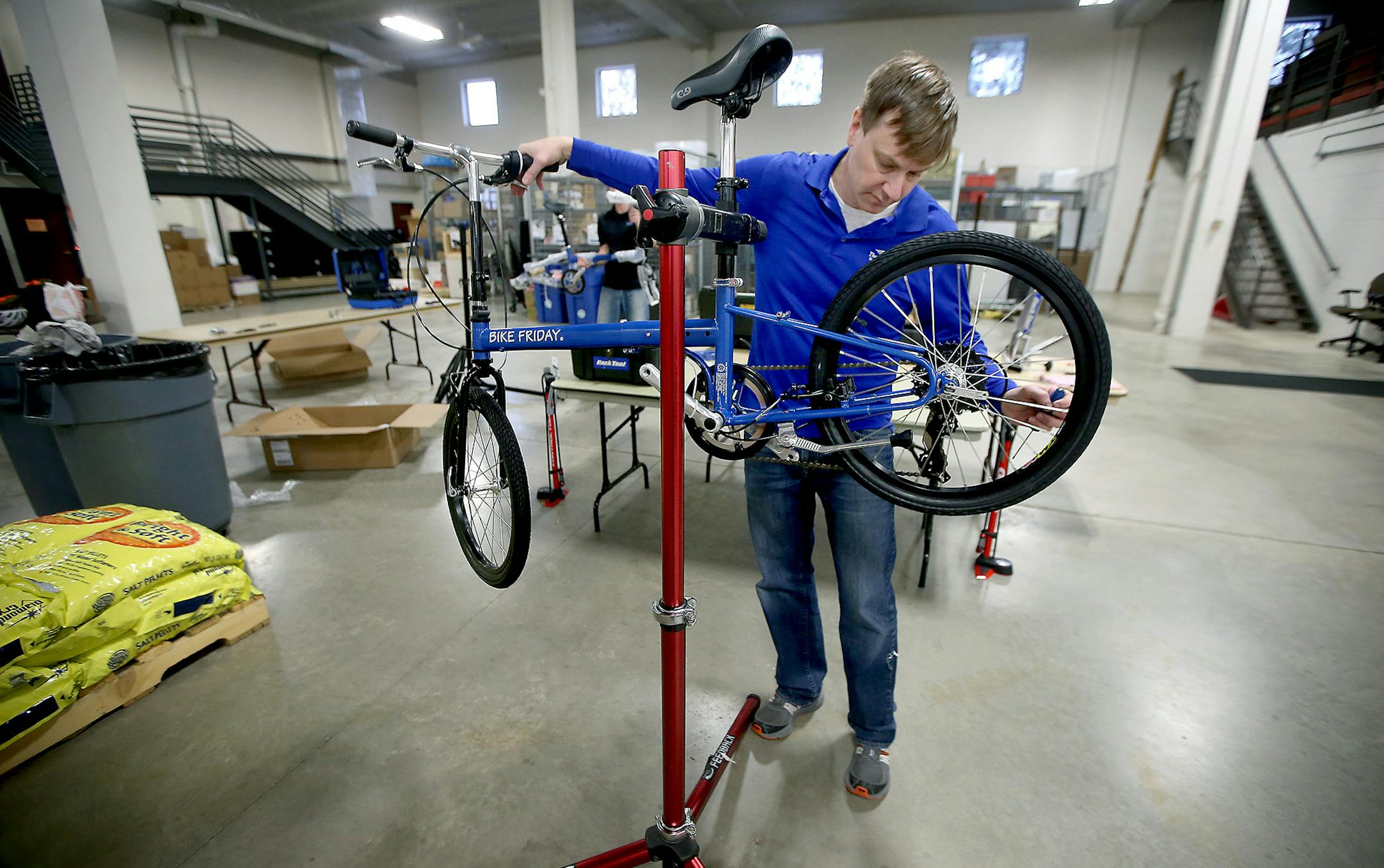 Danny McCullough, of the Three Rivers Park District, worked on assembling one of 37 bikes, Thursday, January 7, 2015 at their Administrative Center in Plymouth, MN. The Three Rivers Park District received a MNDOT Safe Routes to School grant to purchase the fleet of bikes for youth education programs. They are adjustable bikes to fit a 6-year-old to high schooler. ] (ELIZABETH FLORES/STAR TRIBUNE) ELIZABETH FLORES • eflores@startribune.com