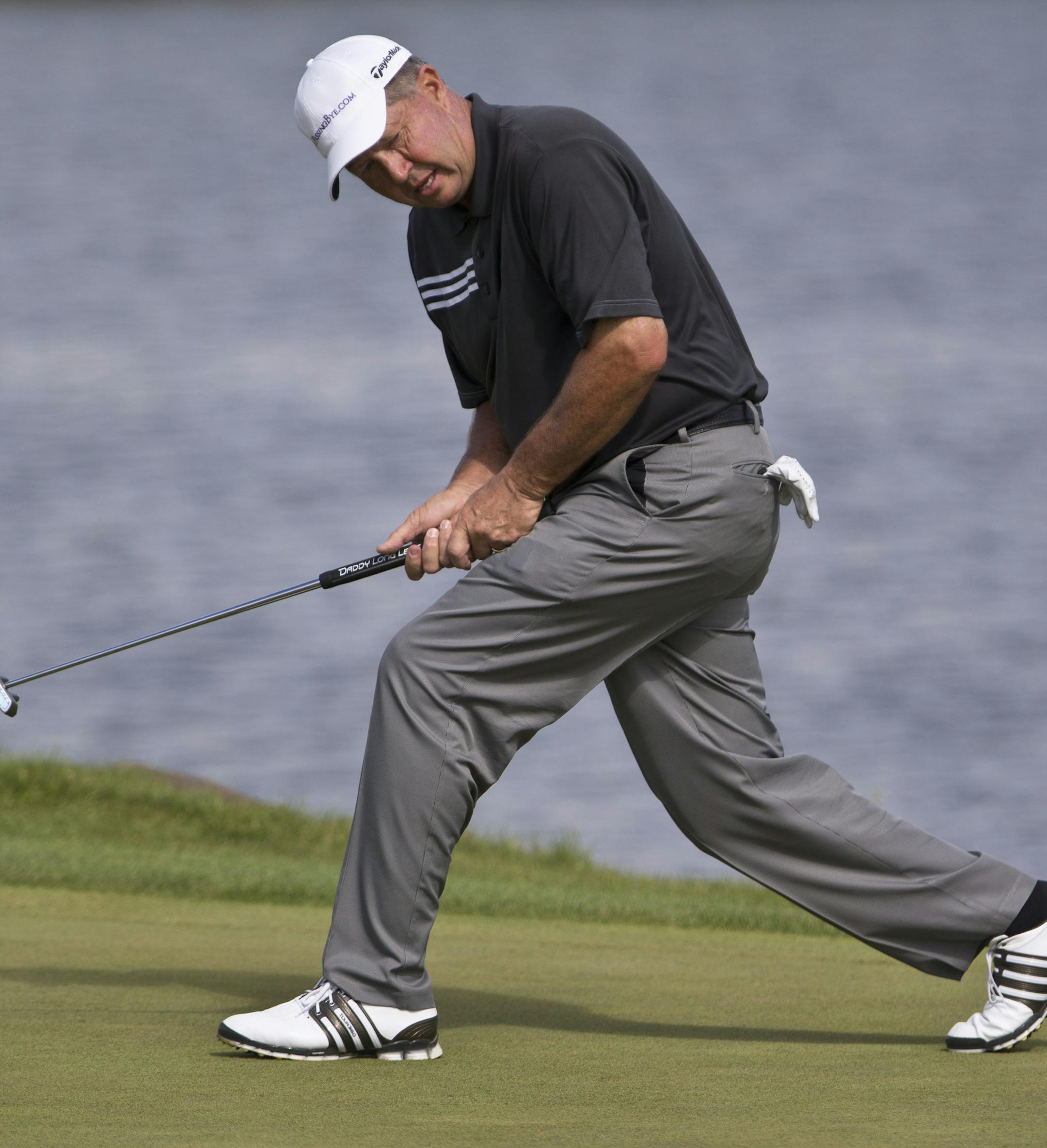 Rod Spittle reacted to missing a birdie on the 17th hole during the 3M Tournament on Sunday, August 4, 2013, at TPC of the Twin Cities golf course in Blaine, Minn. He tied for fourth with 14 under par. ] (RENEE JONES SCHNEIDER • reneejones@startribune.com)