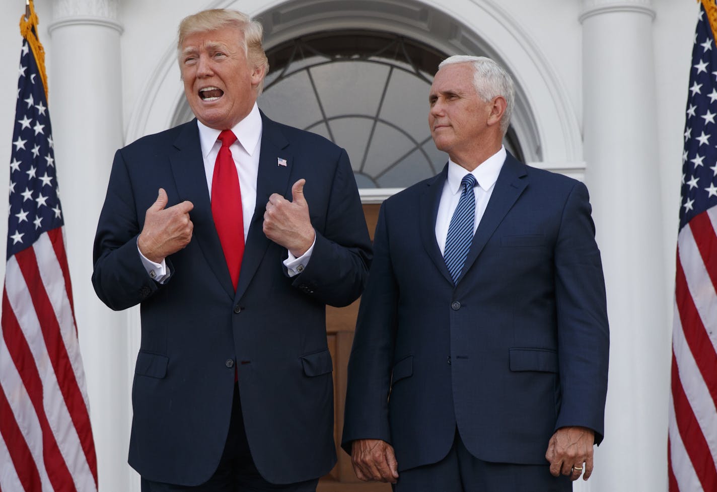 President Donald Trump speaks to reporters at Trump National Golf Club in Bedminster, N.J., on Thursday. Trump refused to back down Thursday from his threat to rain down "fire and fury" on North Korea.