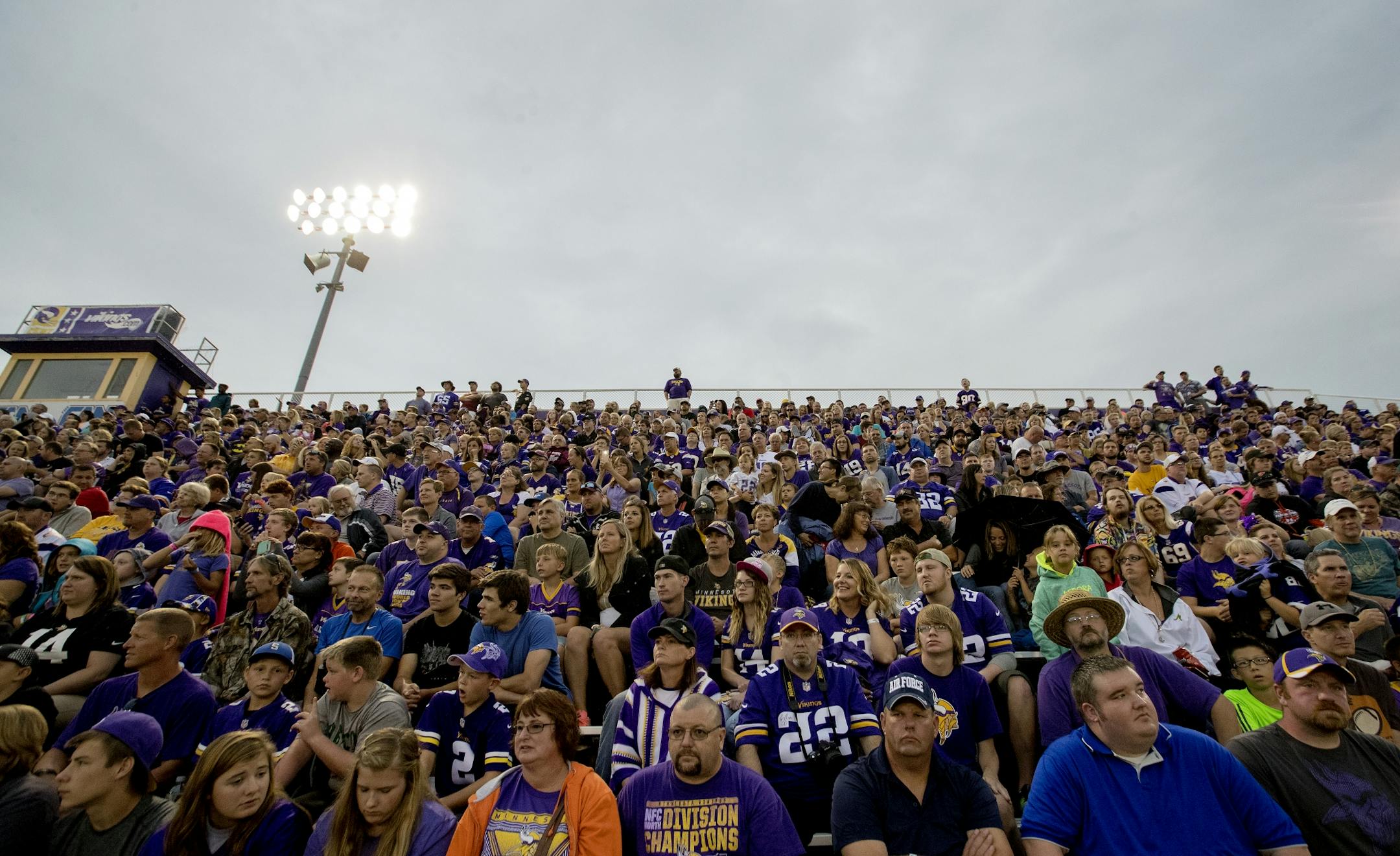 Minnesota Vikings fans watched the team stretch before Saturday night's scrimmage at Blakeslee Stadium in Mankato.