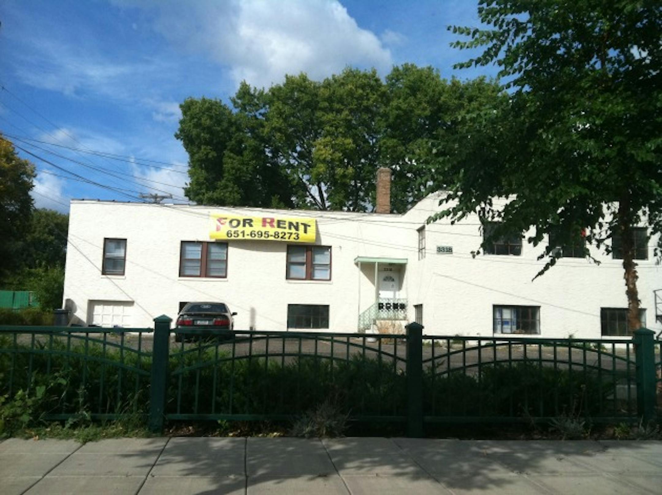 "For rent" sign at 3318 E. Lake St.