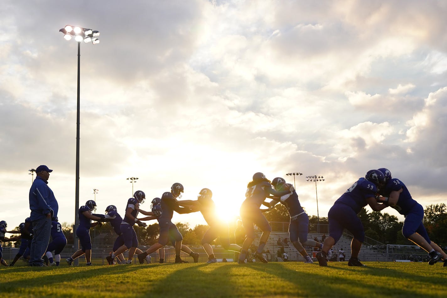 St. Anthony warmed up on the field prior to a game in September.