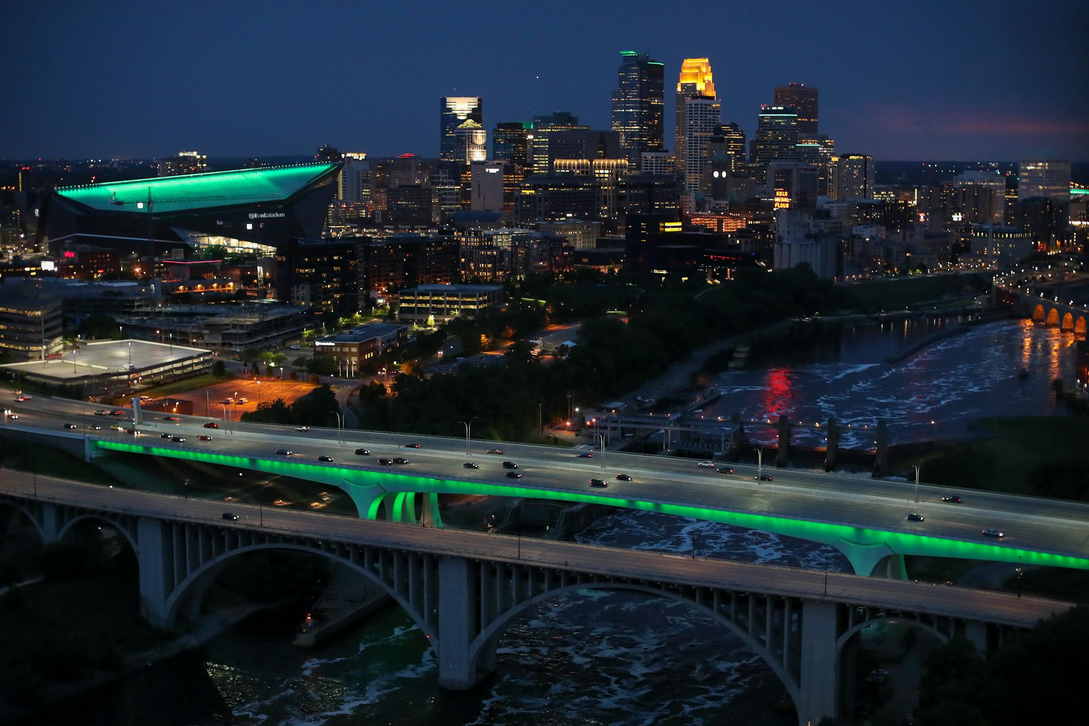 In honor of the Star Tribune's 150th anniversary, several landmark buildings in downtown Minneapolis, including U.S. Bank Stadium, the I-35W bridge and Capella Tower, home of the Star Tribune, were lit in green on May 25, 2017.
