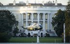 Marine One lifts off from the White House to carry President Donald Trump to Walter Reed National Military Medical Center in Bethesda, Md., Friday, Oc
