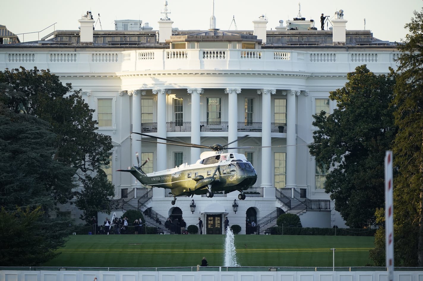 Marine One lifts off from the White House to carry President Donald Trump to Walter Reed National Military Medical Center in Bethesda, Md., Friday, Oct. 2, 2020 in Washington. The White House says Trump will spend a "few days" at the military hospital after contracting COVID-19. (AP Photo/J. Scott Applewhite)