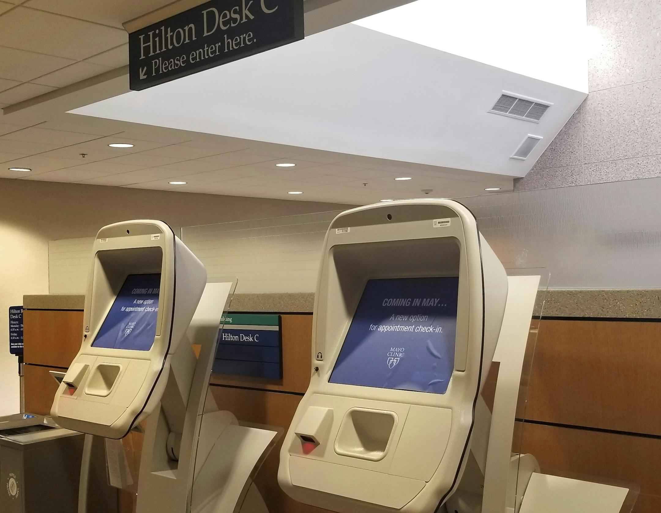 Two Mayo Clinic appointment kiosks that were installed in 2018 as part of a electronics records transition designed by Madison, Wis.-based Epic Systems. The firm is involved in a debate about the future of health records access.