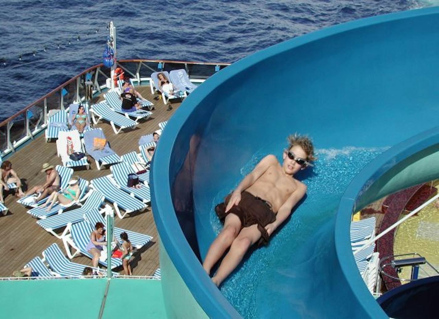 The Carnival Pride keeps kids (and adults) busy with a water slide, swimming, miniature golf, basketball and more.