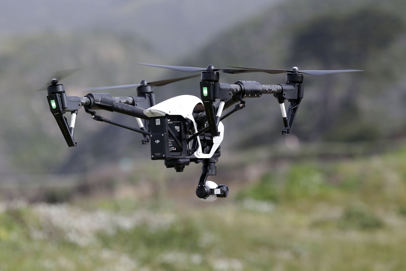 The Inspire 1, a drone manufactured by DJI, is flown Tuesday, March 10, 2015, in Davenport , Calif.