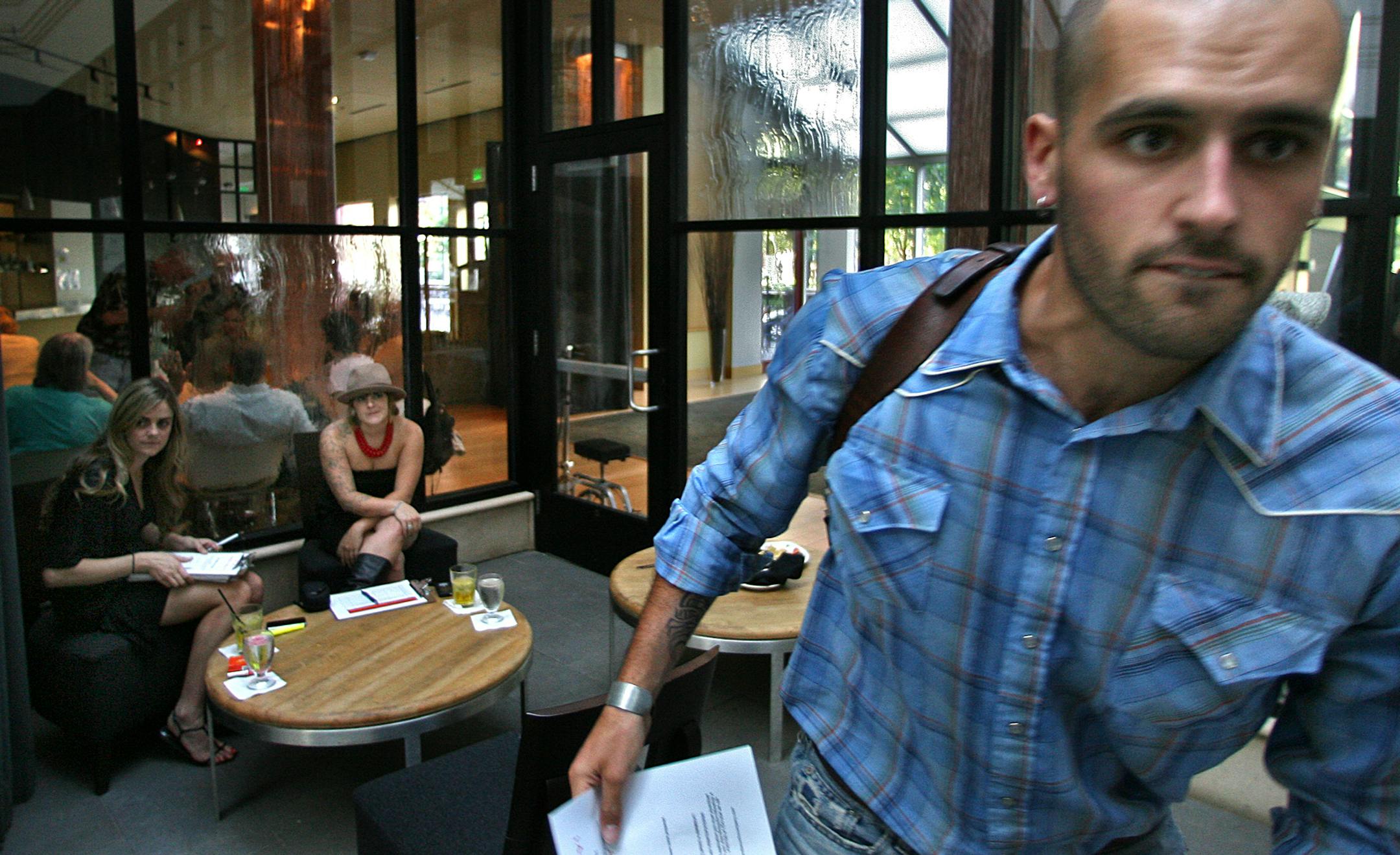 Michael Young, 25, Minneapolis, was called for a second interview by casting producers Melanie Hodges, left, and Stacey Roeder and will learn this week if he will be part of the L.A. call-back. ABC expects to begin shooting 'Beauty' this fall.