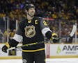 Pacific Division forward John Scott (28) looks into the crowd during the NHL hockey All-Star championship game Sunday, Jan. 31, 2016, in Nashville, Te