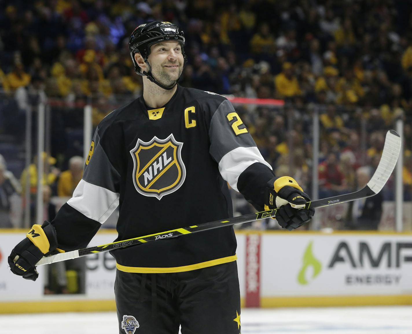 Pacific Division forward John Scott (28) looks into the crowd during the NHL hockey All-Star championship game Sunday, Jan. 31, 2016, in Nashville, Tenn. (AP Photo/Mark Humphrey) ORG XMIT: TNMH1