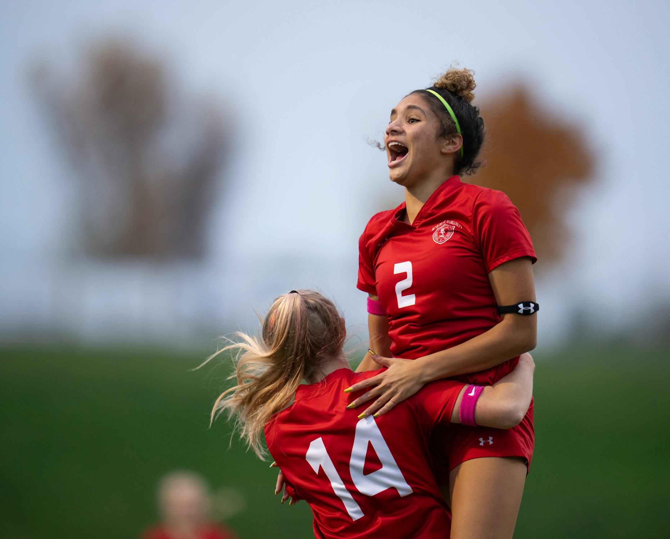 Benilde-St. Margaret's Lyra Carter congratulated Sienna Carver (14) on her goal early in the first half.