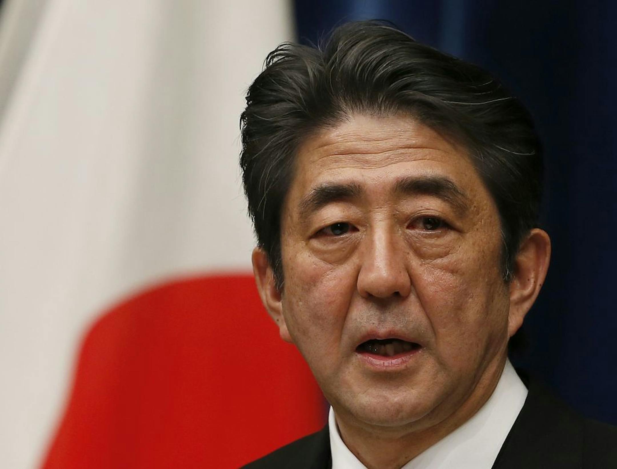 Japan's Prime Minister Shinzo Abe speaks during his first press conference at the prime minister's official residence in Tokyo Wednesday, Dec. 26, 2012.