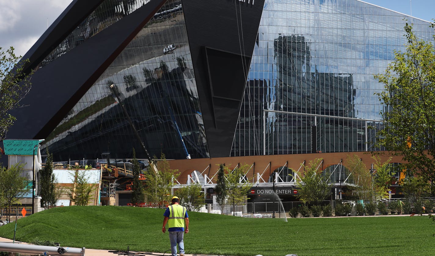 Workers worked on the finishing touches for East Downtown Commons which was just purchased by the city of Minneapolis. [Richard Tsong-Taatarii/rtsong-taatarii@startribune.com