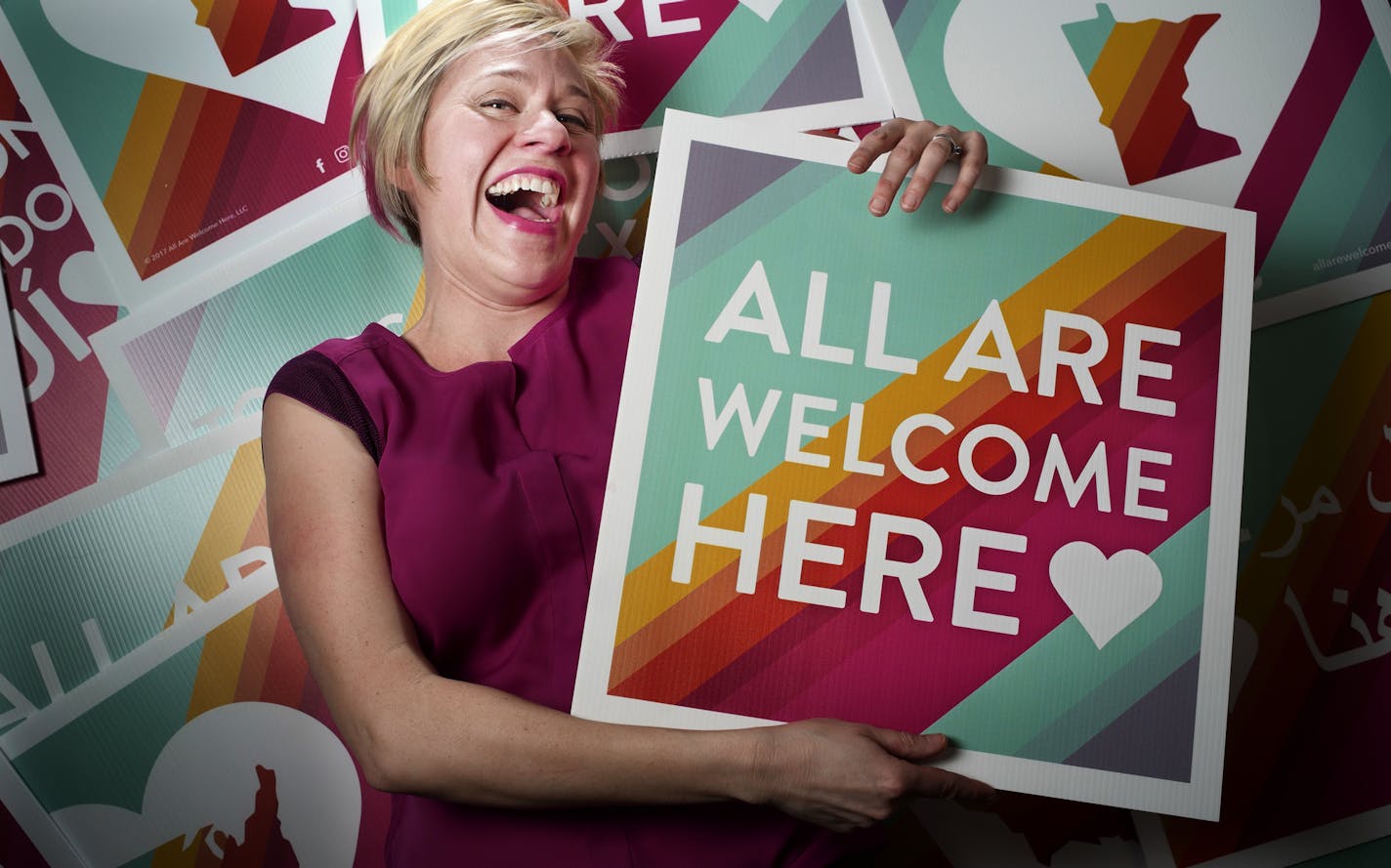 Freelance digital designer Jaime Chismar was inspired by students at Maple Grove High School to create her &#x201c;inclusive&#x201d; &#x201c;All Are Welcome Here&#x201d; signs.